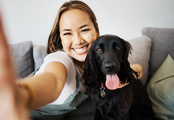 Image showing Selfie, love and woman with dog on home sofa to relax and play with animal. Pet owner, care and asian person influencer with companion, smile and friendship or social media profile picture and memory