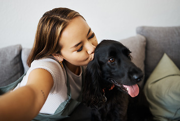 Image showing Kiss, selfie and woman with dog on home sofa to relax, love and play with animal. Pet owner, care and influencer person with companion, trust and friendship or social media profile picture and memory