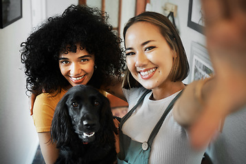 Image showing Smile, selfie and portrait of lesbian couple with dog in modern apartment bonding together. Love, happy and interracial young lgbtq women taking a picture and holding animal pet puppy at home.