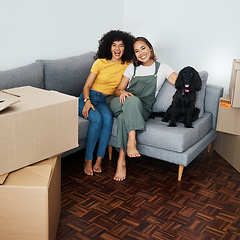 Image showing Dog, lesbian couple and new real estate, portrait and bonding together in living room. Happy gay women with pet in house on sofa, apartment and moving in to property home, laughing and funny animal