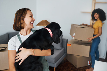 Image showing Dog, lesbian couple and new real estate, funny and bonding together in living room. Happy gay women with pet in house, apartment and moving in to property home, laughing and playing with animal