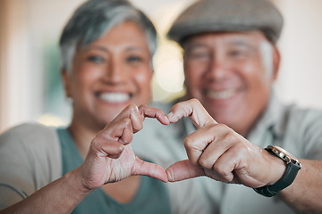 Image showing Portrait, home and senior couple with heart sign, marriage or commitment with support, care or kindness. Face, old man or elderly woman with symbol for love, trust or emoji with peace or relationship