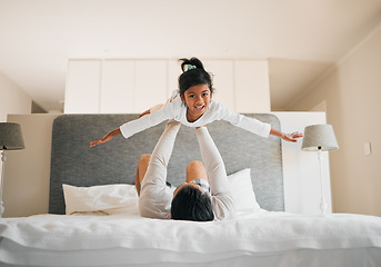 Image showing Portrait, child and dad on bed for airplane games, support and relax for crazy fun together at home. Father, girl kid and excited to fly for freedom, fantasy and balance for play, trust and energy