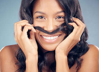 Image showing Curly hair, mustache or portrait of happy woman in studio for wellness, treatment or comedy joke. Haircare, grey background or face of model with funny pose for natural beauty, texture or keratin