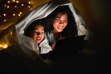 Image showing Night, tablet and mother with child in bedroom with fairy lights for bedtime story, movies and online games. Happy family, reading and mom and kid on digital tech for bonding, love and care in home