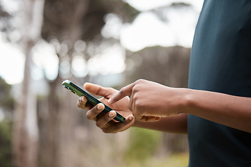 Image showing Man, hands and phone in fitness, social media or outdoor networking for communication in nature. Closeup of male person typing in online texting, sports research or chatting on mobile smartphone app