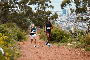 Image showing Race, marathon and people running in nature for fitness competition or sports challenge. Runner or athlete men together for exercise, workout or cardio performance with speed, commitment and wellness