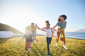 Image showing Nature freedom, love and happy family running, race and playing games, parents chase children and energy on green field. Blue sky, speed and fast kids, mom and dad have fun, wellness or bond together