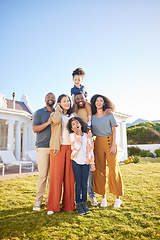 Image showing Parents, grandparents and children outdoor portrait at house laughing together on funny vacation in summer. Interracial family at a holiday home with happiness of men, women and kids with sky banner