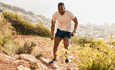 Image showing Fitness, trail or runner running on mountain by nature for exercise, training or outdoor workout. Sports race, fast black man or healthy active athlete on hill with endurance, freedom or challenge