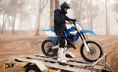 Image showing Motorbike, man and sports in forest with training for competition, riding in nature with action and helmet. Extreme, adrenaline and exercise, athlete and transport with dirt bike, freedom and travel
