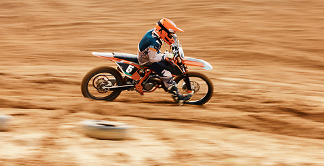 Image showing Motorcycle, driving and motion blur with a man on space in the desert for dirt biking. Bike, fitness and power with a fast person on an off road course for sports, freedom or performance challenge