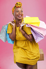 Image showing Shopping, thinking and black woman with bags, luxury items and fashion on a pink studio background. African person, customer or model with expensive clothes, retail or boutique products with decision