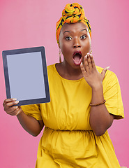 Image showing Tablet, screen and mockup, black woman and surprise face for website ads and technology marketing on pink background. App, UX and logo design with tech brand, wow reaction and information in studio