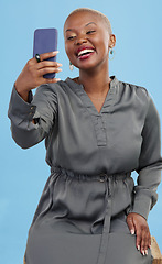 Image showing Happy, selfie and black woman excited for mobile app video call isolated in studio blue background with prize. Connection, African and happy person or content creator live streaming on social media