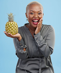Image showing Portrait, wow and black woman pineapple in studio for detox, lose weight or diet nutrition on blue background. Fruit, face and African lady nutritionist show vegan, lifestyle or organic diet choice