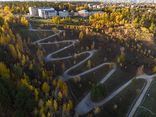 Image showing Aerial top vew of winding road in the city