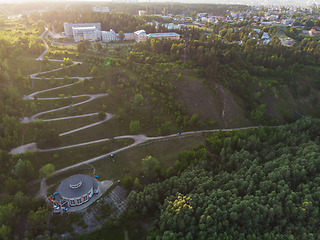 Image showing Aerial top vew of winding road in the city