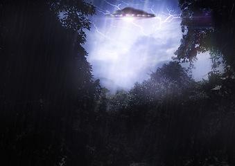 Image showing Ufo, spaceship light and alien in forest for mission, science fiction and fantasy in sky with thunder. Spacecraft, countryside and flying saucer from outer space for invasion, futuristic and mystery