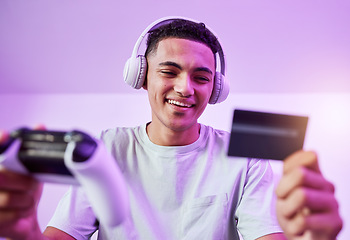 Image showing Esports, credit card and man with video game ecommerce for purchase with controller in virtual challenge. Internet, user experience and person or happy gamer streaming sports games online in lounge