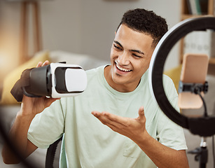 Image showing Virtual reality, gaming and review, social media and man with ring light, tech review with influencer or online gamer. Video game, young streamer and content creation for gaming promo and feedback