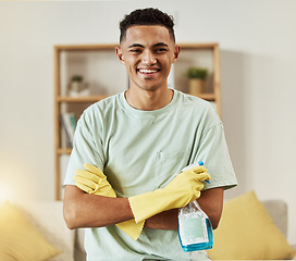 Image showing Cleaner, man in portrait and chemical with arms crossed, happy and hygiene with housekeeping, detergent and gloves. Janitor, cleaning solution in bottle with smile and professional housekeeper