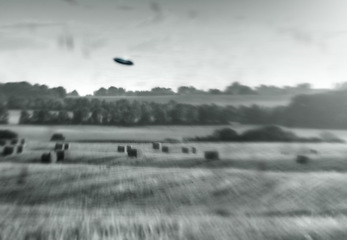 Image showing Alien, spaceship and UFO on farm, nature or sky with fantasy or science fiction event in countryside, field or landscape. Earth, aliens and extraterrestrial drone in environment with blur or motion
