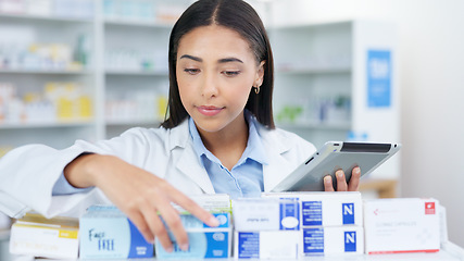 Image showing Medicine, tablet and woman chemist doing research at dispensary for prescription treatment. Medical, digital technology and female pharmacist check stock inventory for medication in drugstore clinic.
