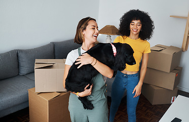 Image showing Moving, lesbian and couple with dog in new home, boxes and smile in real estate together. Property, mortgage and lgbt women with puppy in living room happy and excited for pet, love and house