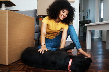 Image showing New home, box and woman on the floor with dog in real estate, flat or moving, loan or housing. Mortgage, investment and female on floor with property, smile and satisfied with pet friendly apartment