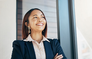 Image showing Thinking, crossed arms and business woman by window for ideas, career opportunity and job in office. Professional, happy and face of worker in workplace with confidence, ambition and success mindset