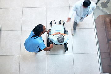 Image showing Wheelchair, hospital and patient above with nurse, helping and support with healthcare. Doctor, clinic and surgery care of an elderly man with a mobility disability ready for medical consultation