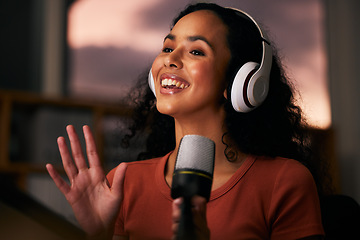Image showing Woman, headphones and microphone, radio talk show and podcast, press journalist and live broadcast at night. Happy, tech and multimedia, communication and social media streamer with content creation