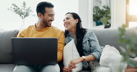 Image showing Couple, laptop and laugh on sofa in home for meme, watch movies and streaming funny multimedia. Happy man, woman and relax at computer in living room on social media, web subscription or comedy show