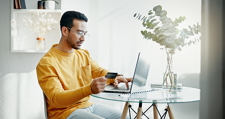 Image showing Home, laptop or man with a credit card, ecommerce or online banking with transactions, payment or discount code. Person, pc or guy with finance, digital sale or fintech with web promotion or purchase