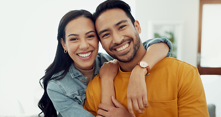 Image showing Couple, hug in portrait and relax in lounge with love, bonding and happy people together at home. Healthy relationship, trust and support in commitment, partner and marriage with romance and intimacy
