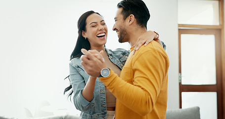 Image showing Couple, dancing in living room and love, bonding and happy people together at home. Healthy relationship, trust and support in commitment, partner and marriage, romance and intimacy with laughter