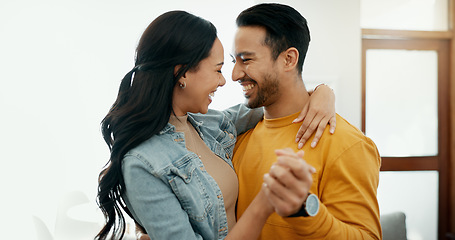 Image showing Dance, happy and a couple in a house for romance, love or support together. Funny, smile and a laughing man and woman with fun, honeymoon and bonding in a living room for a date, care or affection