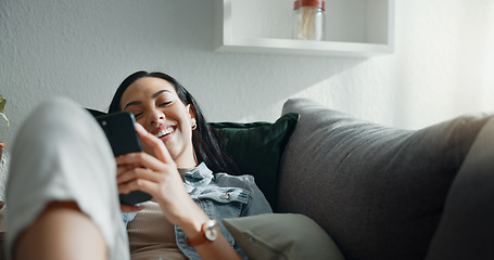 Image showing Happy woman, thinking and relax with smartphone on sofa, scroll social media and reading notification at home. Cellphone, smile and search connection, download digital app and contact in living room