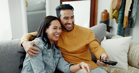 Image showing Couple, smile and watch movies on tv, news and cable show for media broadcast on sofa at home. Happy man, woman and people change television remote for streaming multimedia, subscription and comedy