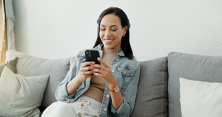 Image showing Woman, relax and typing on smartphone on sofa, reading social media post or mobile chat at home. Cellphone, app and download digital games, scroll connection or multimedia notification in living room
