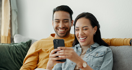 Image showing Couple, laugh and talking on sofa with phone for social media post, subscription and reading funny notification. Happy man, woman and scroll on smartphone for meme, web app and relax in living room