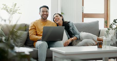 Image showing Couple, laptop and laugh on sofa in home for meme, watch movies and streaming funny multimedia. Happy man, woman and relax at computer in living room on social media, web subscription or comedy show