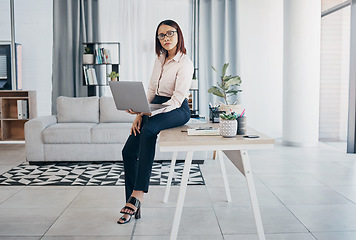 Image showing Portrait, woman and office with laptop, working and thinking in corporate clothes, alone and serious. Sitting on desk, virtual meeting and writing report for client review and business manager stats