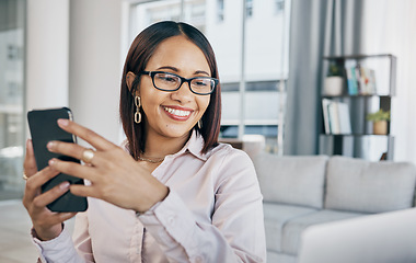 Image showing Cellphone, laptop and businesswoman in the office typing an email or networking on internet. Communication, technology and professional female designer doing creative research on a phone and computer