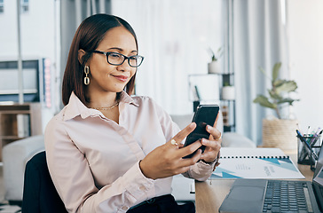 Image showing Smartphone, laptop and businesswoman in office typing an email or networking on internet. Communication, technology and professional female designer doing creative research on cellphone and computer.