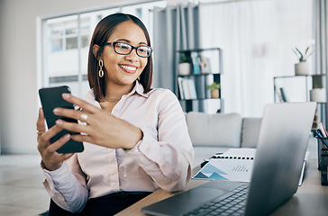 Image showing Phone, laptop and businesswoman in the office typing an email or networking on internet. Communication, technology and professional female designer doing creative research on cellphone and computer.