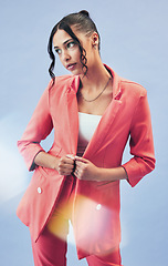 Image showing Business woman, worker fashion and thinking with gen z style and cosmetics in studio. Trendy, stylish and female professional with model freedom, entrepreneur and modern clothes with blue background