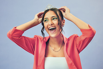 Image showing Beauty, excited and woman with crown in studio for glamour, luxury and winning prize. Fashion, wow and isolated person with tiara for princess winner, pageant and cosmetics on purple background