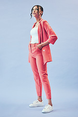 Image showing Fashion, beauty and trendy girl in studio with makeup, confidence and body in suit. Thinking, style or influencer girl in designer clothes, gen z business outfit and model standing on blue background